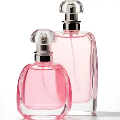 3d Model Two Pink Perfume Bottles With Silver Caps One Large And One Small On A Light Pink Background Minimalist Design Soft Lighting Elegant Presentation Figure Octane Render Volumetric Highly Detailed Videogam 9 596d