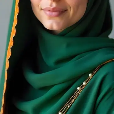 A 22 Year Old Middle Eastern Woman With Brown Hair Wearing A Green Hijab With Orange Edges Neutral Background 26 42d1