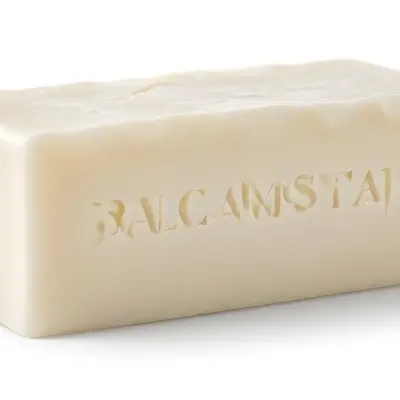 A Bar Of White Soap With A Slightly Rough Texture Casting A Soft Shadow On A Plain White Background 9 481c