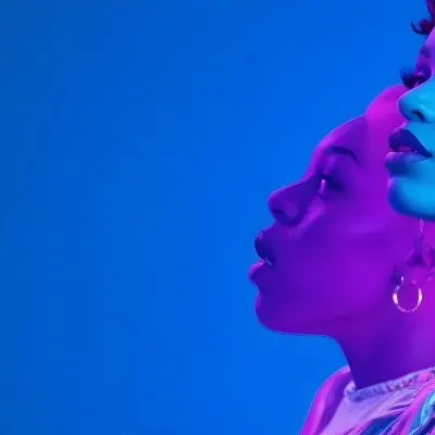 A Black Woman 25 Years Old With A Blue Skin And Big Earrings In A Blue Background 50 3419