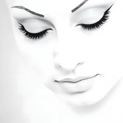 A Black Young Woman Age 22 With Closed Eyes Long Eyelashes And White Eyeliner In A Black Background 3 F200