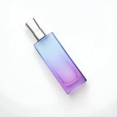 A Blue And Purple Gradient Perfume Bottle With A Silver Cap On A White Background 20 4740