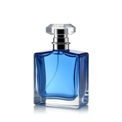 A Blue Glass Perfume Bottle With A Square Shape And A Transparent Cap On A White Background 33 5015