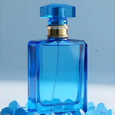 A Blue Perfume Bottle With A Blue Neck And A Golden Cap Surrounded By Small Blue Crystals In A Bright Studio 2 3d9e