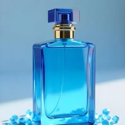 A Blue Perfume Bottle With A Blue Neck And A Golden Cap Surrounded By Small Blue Crystals In A Bright Studio 3 7f80