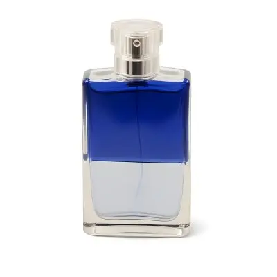 A Blue Perfume Bottle With A Transparent Cap On A White Background The Bottle Is Half Blue And Half Transparent 13 3e13