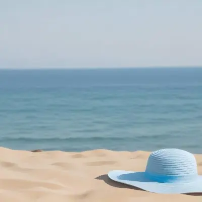 A Blue Sun Hat And Blue Sunglasses On A Sandy Beach With A Blue Sea And Sky In The Background 18 234b