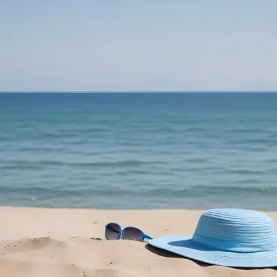 A Blue Sun Hat And Blue Sunglasses On A Sandy Beach With A Blue Sea And Sky In The Background 9 5730