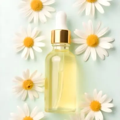 A Bottle Of Yellow Liquid Surrounded By White Daisy Flowers On A Light Background 13 E978