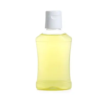 A Bottle Of Yellow Mouthwash With A Yellow Cap The Background Is Plain White 12 Cdcb