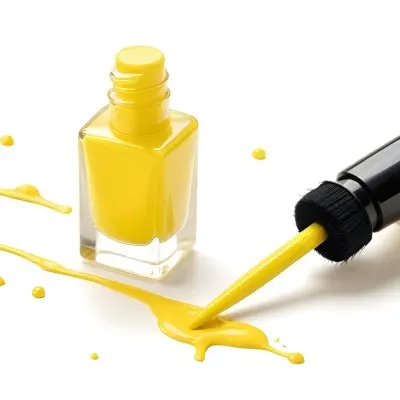 A Bottle Of Yellow Nail Polish With A Yellow Cap And Brush A Drop Of Nail Polish On A Yellow Background 8 B888