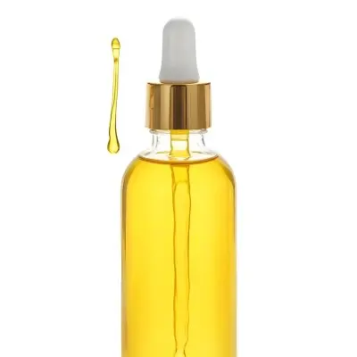 A Bottle With Yellow Oil And A Golden Dropper With A White Cap On A White Background 21 7a25