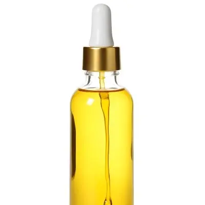 A Bottle With Yellow Oil And A Golden Dropper With A White Cap On A White Background 5 1d88