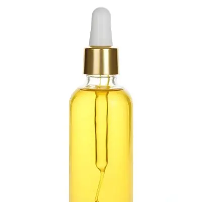 A Bottle With Yellow Oil And A Golden Dropper With A White Cap On A White Background 6 Cf6e