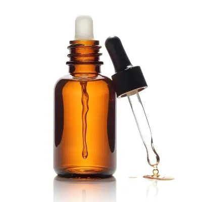 A Brown Glass Bottle With A Dropper Containing A Liquid Substance In A Brightly Lit Room With Sunlight Streaming In 24 C5d1