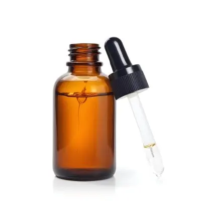 A Brown Glass Bottle With A Dropper Containing A Liquid Substance In A Brightly Lit Room With Sunlight Streaming In 5
