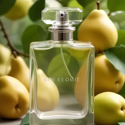 A Clear Glass Perfume Bottle With A Square Cap Placed Among Green Leaves And Yellow Pears The Background Features Soft Natural Lighting Highlighting The Bottle And The Surrounding Fruits 9 B110