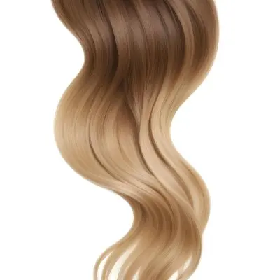 A Close Up Image Of Long Wavy Blonde Hair With Brown Roots Showcasing A Natural Looking Ombre Or Balayage Hair Color Effect 10 7494