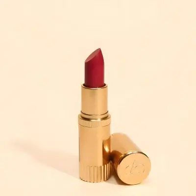A Close Up Of A Red Lipstick In A Gold Lipstick Tube 4 C5c7