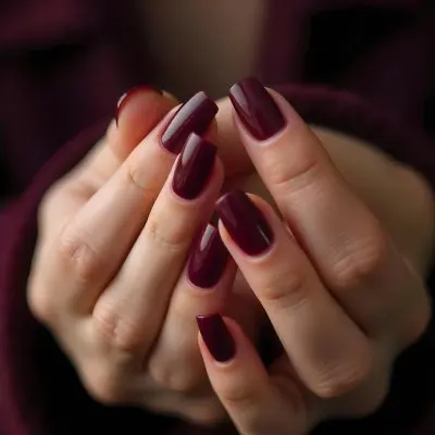 A Close Up Of A Woman S Hands With Dark Red Nail Polish 18 1b65
