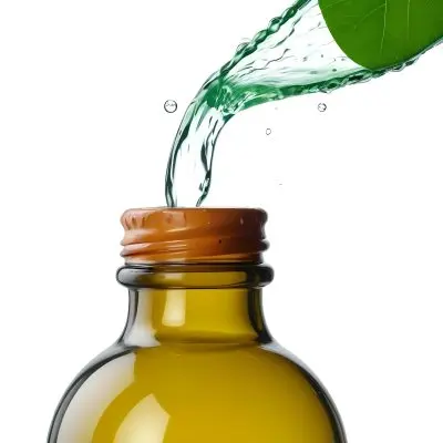 A Drop Of Water Falling From A Green Leaf Into A Green Glass Bottle White Background 7 00eb