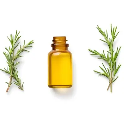 A Glass Bottle Filled With Yellow Essential Oil Surrounded By Sprigs Of Rosemary On A White Background 28 631f