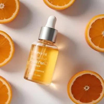 A Glass Bottle Of Orange Colored Facial Oil Or Serum Surrounded By Sliced Oranges On A White Background 10 8100