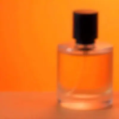 A Glass Bottle Of Perfume Or Cologne On An Orange Background 33 7322