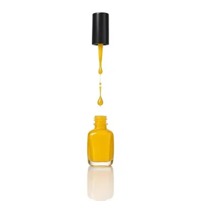 A Golden Nail Polish Bottle With A Drop Falling Into It And The Brush Above It On A White Background 28 14cb