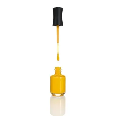 A Golden Nail Polish Bottle With A Drop Falling Into It And The Brush Above It On A White Background 29 Efb5