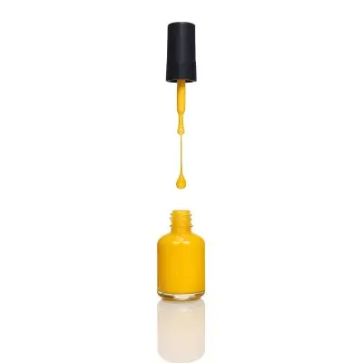 A Golden Nail Polish Bottle With A Drop Falling Into It And The Brush Above It On A White Background 37 Dd45