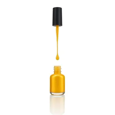 A Golden Nail Polish Bottle With A Drop Falling Into It And The Brush Above It On A White Background 38 Fc6b