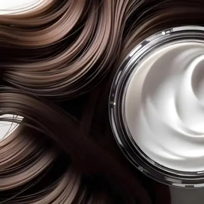 A Jar Of White Cream Next To Long Wavy Brown Hair The Jar Is On The Right Side Of The Image And The Hair Is On The Left Side 1 1341