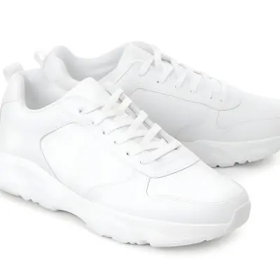 A Pair Of White Sneakers With White Laces White Sole White Background 1 35d3