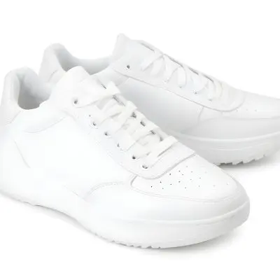 A Pair Of White Sneakers With White Laces White Sole White Background 27 B8c8