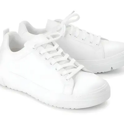 A Pair Of White Sneakers With White Laces White Sole White Background 9 65f1