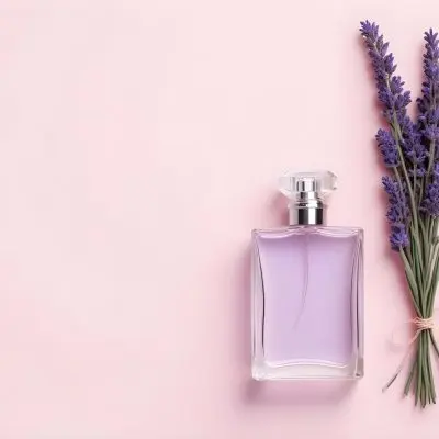 A Perfume Bottle And A Lavender Bouquet On A Pink Background Flat Lay Product Photography Studio Shot Soft Lighting Minimalist Composition Elegant Clean Fresh 31 1b75