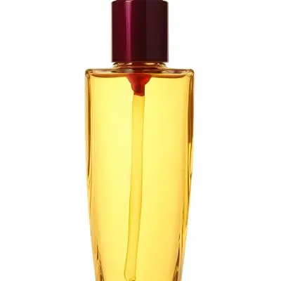 A Perfume Bottle With A White Cap And A Red Liquid Inside The Background Is White 33 063e