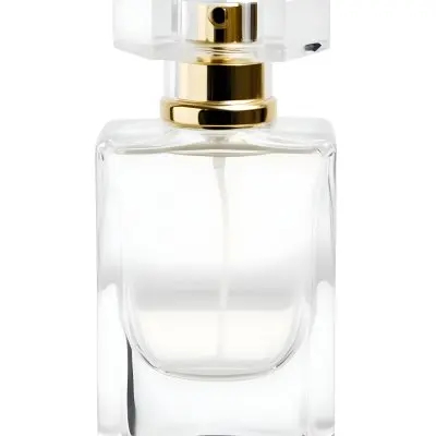 A Perfume Bottle With A White Cap On A White Background The Bottle Is Transparent And Rectangular The Liquid Inside Is White 34 44bd