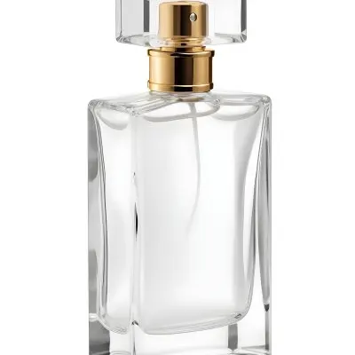 A Perfume Bottle With A White Cap On A White Background The Bottle Is Transparent And Rectangular The Liquid Inside Is White 47 2e5b