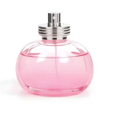 A Perfume Bottle With Pink Liquid Inside Pink Cap On A White Background 11 55b5