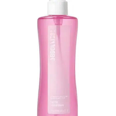 A Pink Body Spray Bottle With A White Cap And A Pink Label On A Pink Background 6 3abc