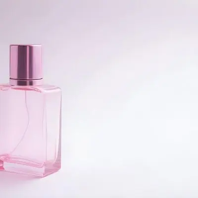 A Pink Perfume Bottle With A Metallic Pink Cap Simple Square Design On A White Background Minimalist Aesthetic Soft Lighting Product Photography 36 16ab