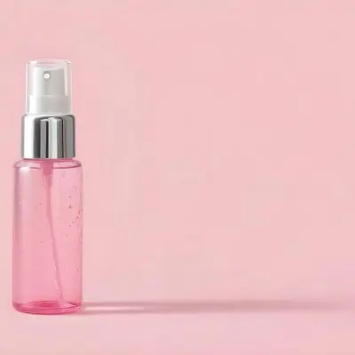 A Pink Spray Bottle With Silver Details And A Transparent Cap The Bottle Is Filled With A Pink Liquid With Silver Glitters Pink Background 43 8ab6