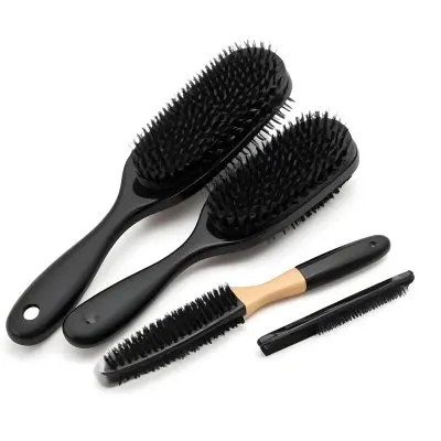 A Set Of Black Hair Brushes And Combs 2 062a
