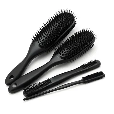 A Set Of Black Hair Brushes And Combs 6 2498