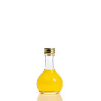 A Small Glass Bottle With A White Cap Filled With Yellow Liquid Isolated On A White Background Studio Shot Product Photography 15 B024