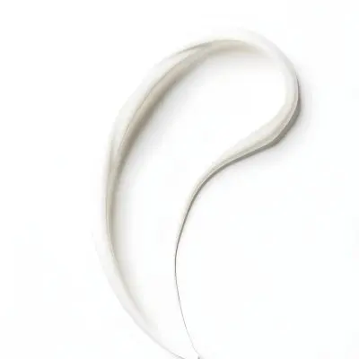 A Smear Of White Cream With A Smooth Texture Swirled On A Clean White Surface Creating A Simple Minimalist Composition 30 C3af