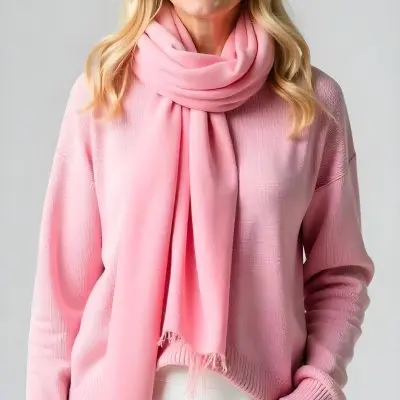 A White Woman 30 Years Old With Blonde Hair Wearing A Pink Sweater A White Skirt And A Pink Scarf Studio Background 28 3806