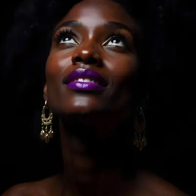 A White Woman Dark Skin 23 Years Old Curly Black Hair Purple Lipstick And Earrings Looking Up In A Black Background 19 E844